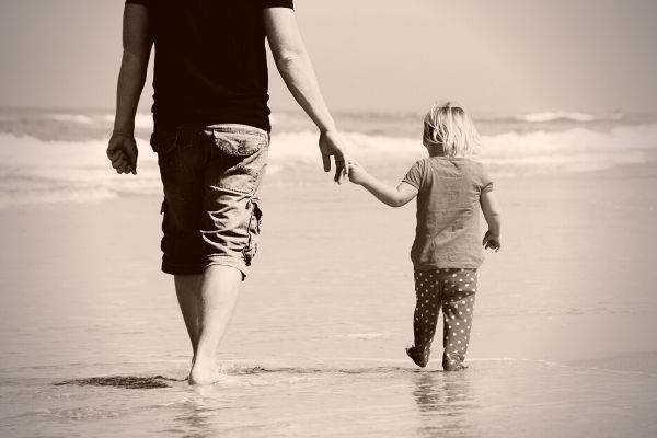father and daughter walking together